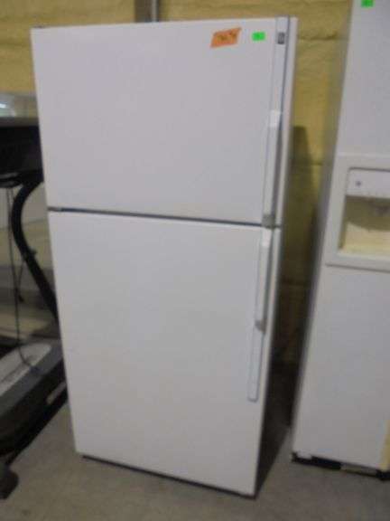 GE refrigerator. Works. Needs cleaned. 29" wide x 29" deep x 64.5" tall. See pictures.