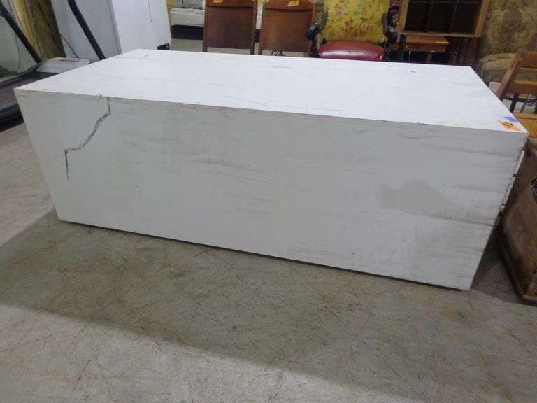 Twin bed base. Has wheels. Could be used for other things. See pictures.