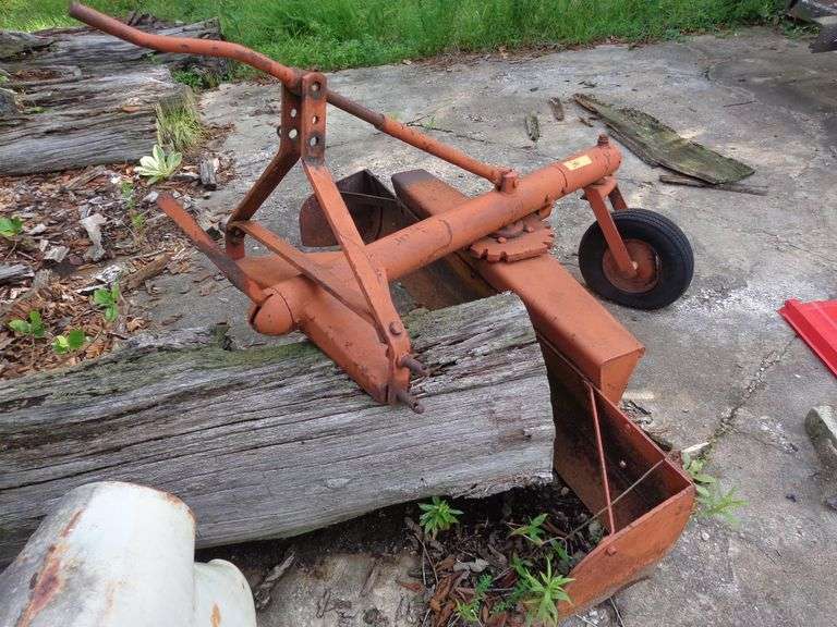 Steel grader blade with wheel, 6 feet long