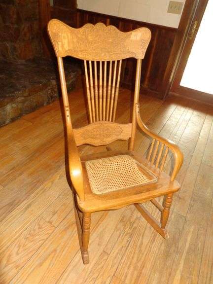 Oak cane bottom rocker, has busted seat