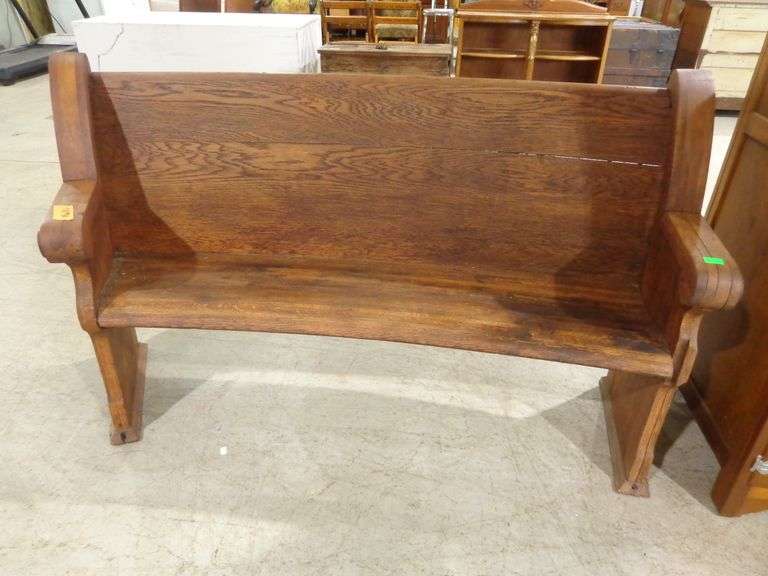 Wooden Church Pew. Has slight curve on one end. Approximately 63" long x 16" deep x 35" tall. See pi