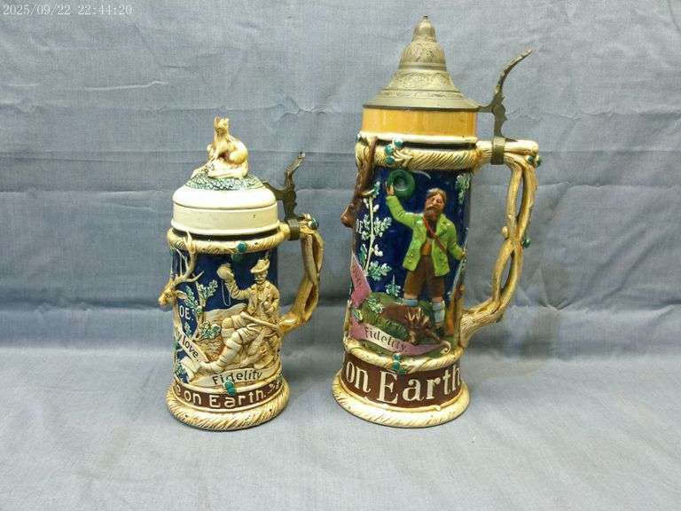 1-half liter and 1-1 liter stein Elks Club