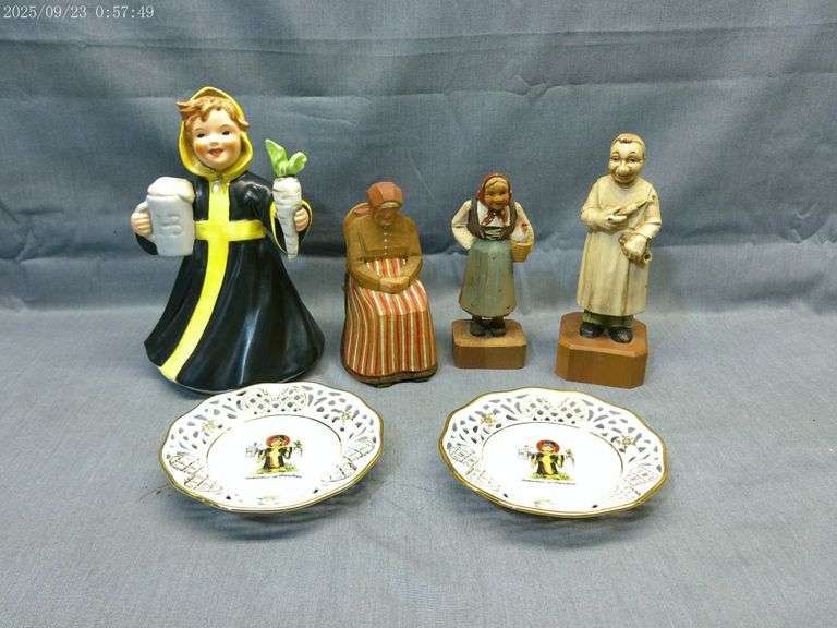 Munich made Hummel figurine with 2 Munich made plates and 3 wood carvings