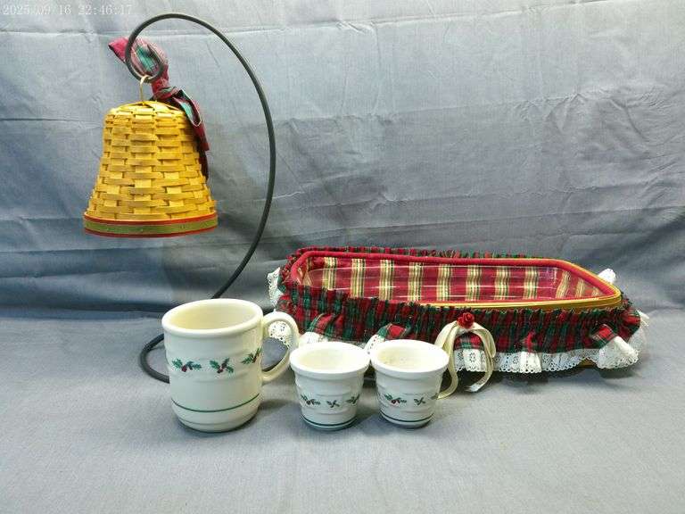 Longaberger 2003 bread basket, bell with wrought iron hanger, 1 Christmas mug, 2 Christmas votives
