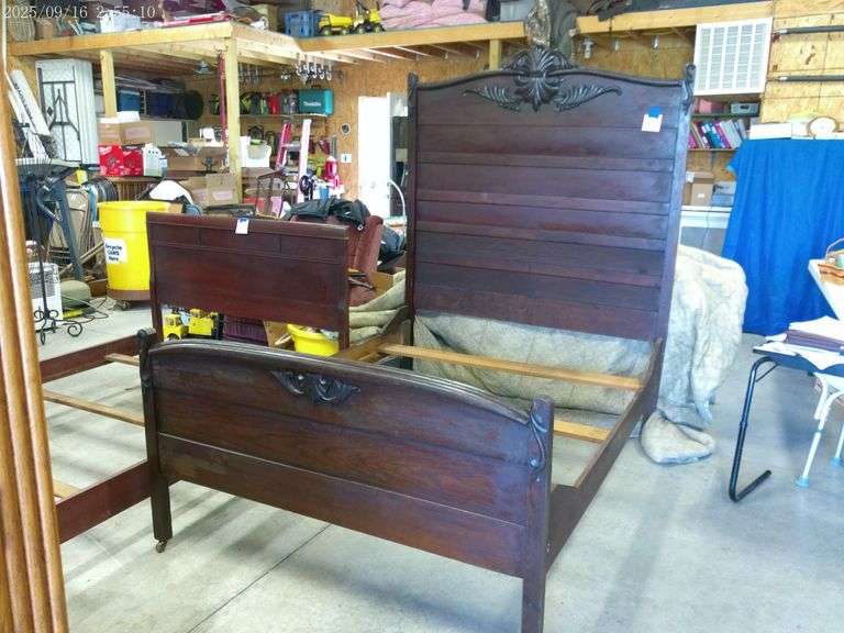 Antique full size bed. Headboard is 75"T x 53"W. Footboard is 57"W x 32"T. Has slats