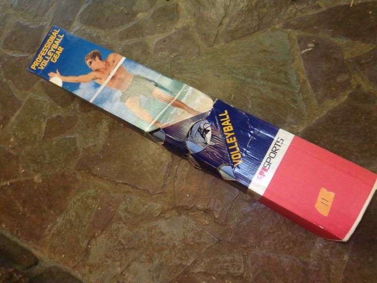 Portable volleyball net set. Contents not inspected.