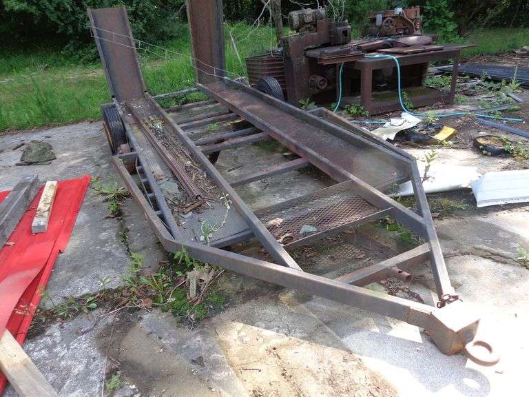Car hauler trailer with ramps, 16 feet long, missing tire on both sides, pendle hitch