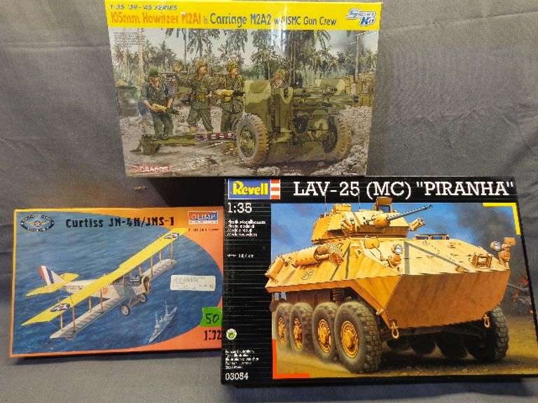 Model plane, tank, and artillery, Curtiss JN-4H 1/72 scale, LAV-25 Piranha 1/35 scale, USMC Gun Crew
