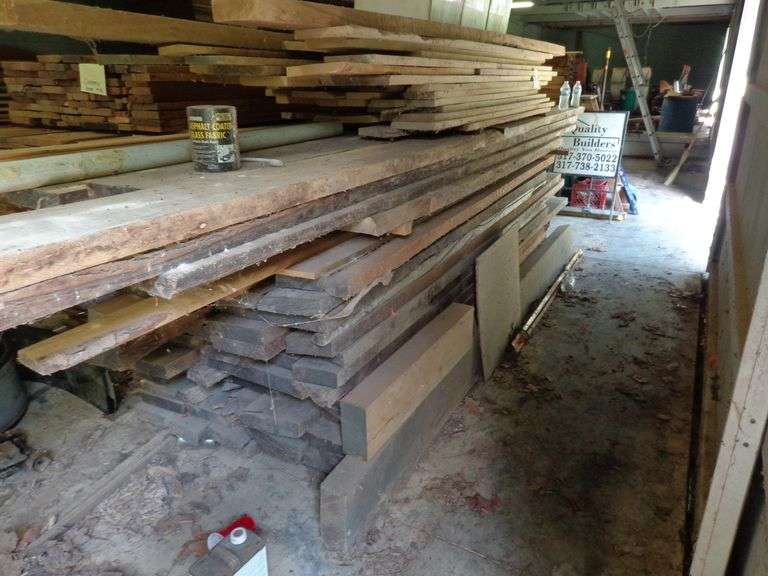 Stack of wood planks, varying lengths and thickness