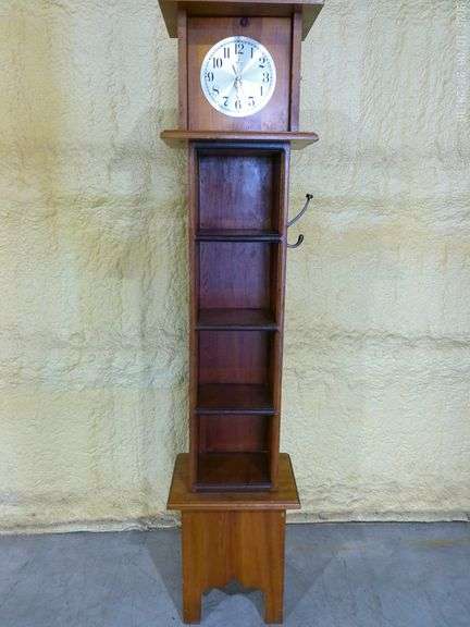 808- Small wooden shelf with battery clock 14" by 11", 64" tall