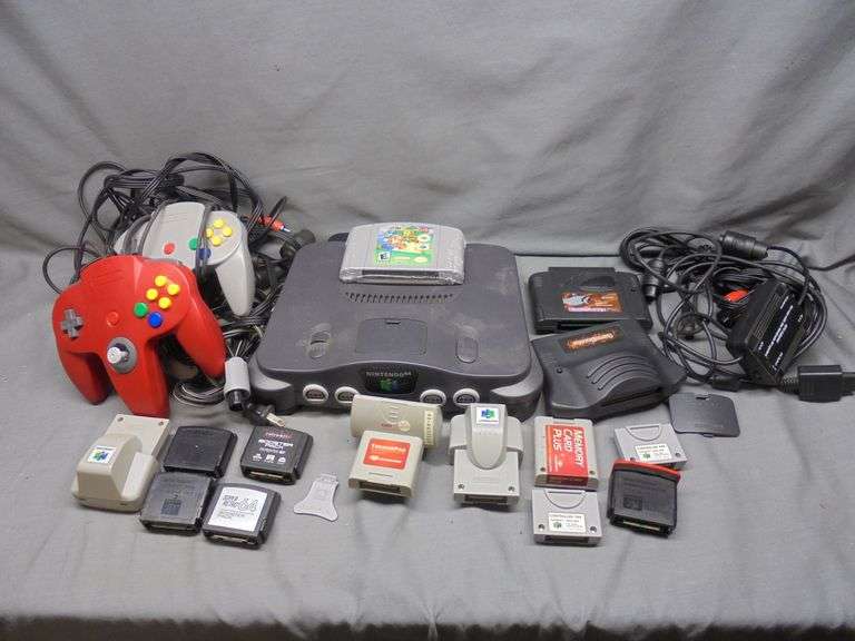 Nintendo 64 game system with 2 remotes. Comes with Super Mario 64 games. Also includes several boost