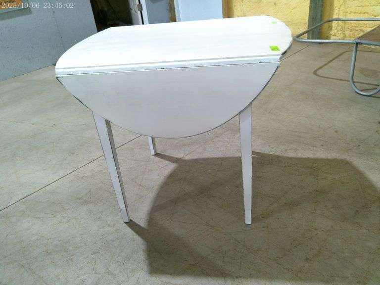 810- White sturdy wooden drop leaf table, 42" with leaves up