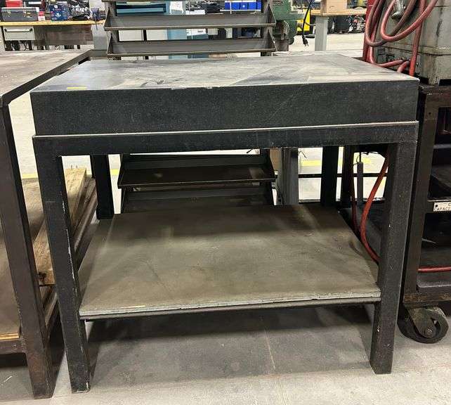 34"H X  24"W X 36"L        Graplate Table Top on Metal Work Table