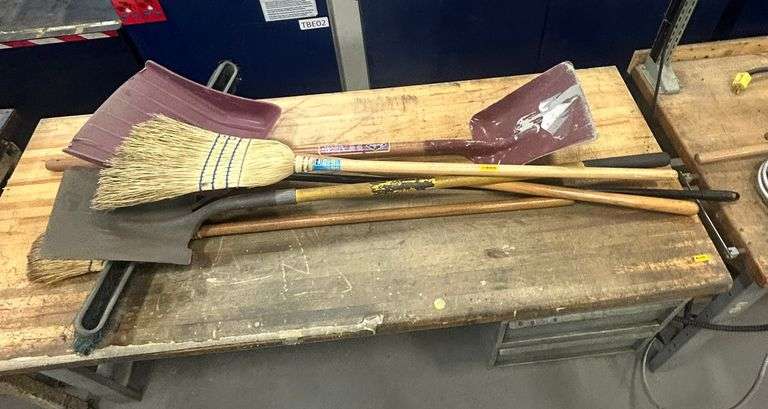 Assorted Brooms and Shovels