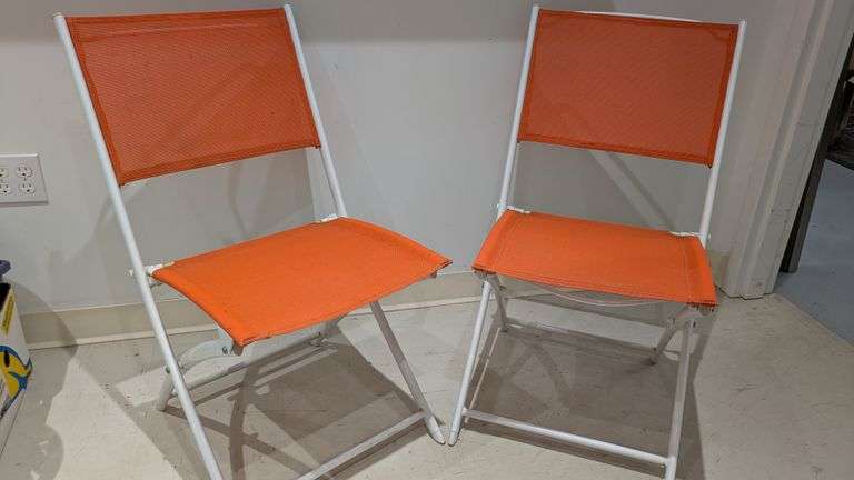 Pair of Folding Chairs with Orange Fabric Seats and Backs