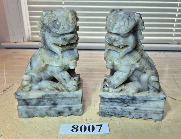 Pair of carved stone foo dog bookends