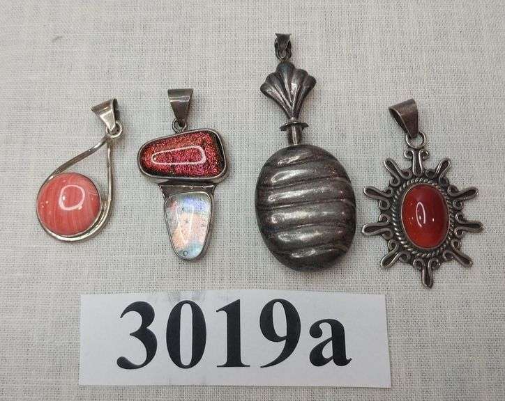 4 sterling silver pendants