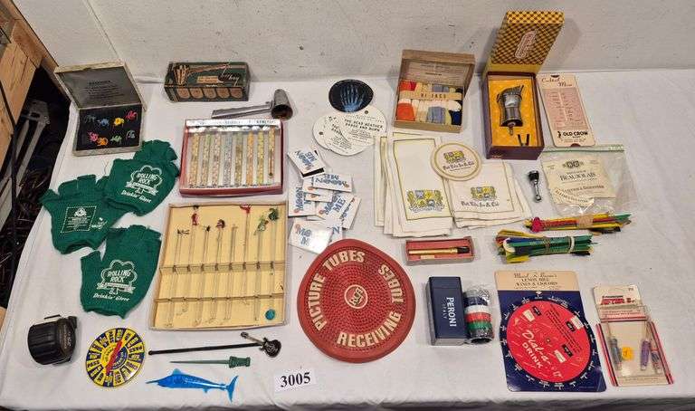 Vintage bar items including swizzle sticks, drinking game, Etc.
