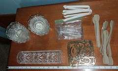 Tupperware pie taker, serving accessories, glass and plastic serving dishes, tongs, trivet, Etc