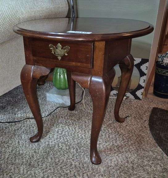 Cherry one drawer oval end table