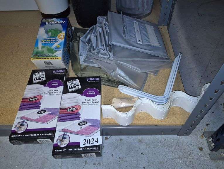 Hanging organizers, vacuum storage bags, Mr. Steamy dryer ball, shelf brackets, Etc