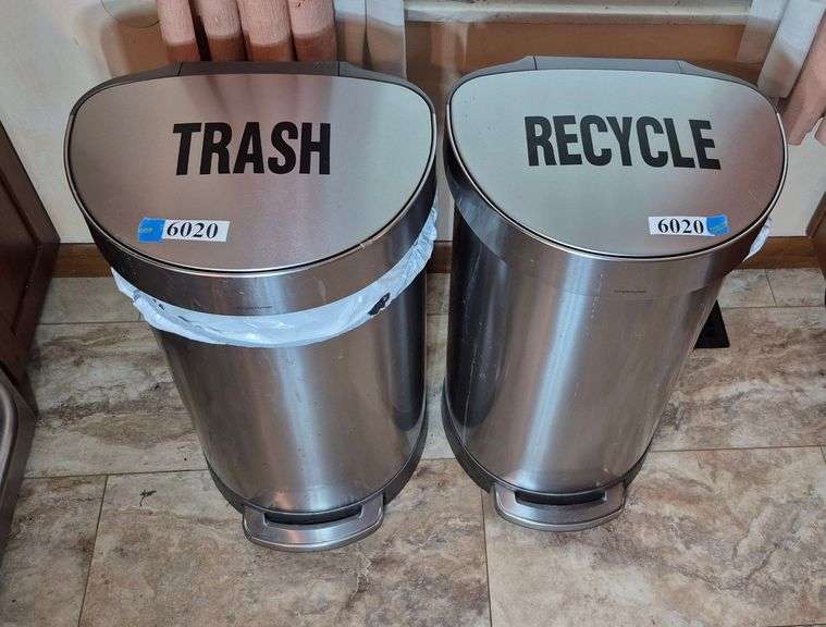 Pair of simple human stainless steel trash bins labeled trash and recycle