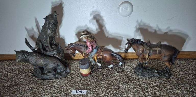 Three plastic figurines