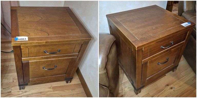 Pair of Arhaus end tables / nightstands on wood rollers.
