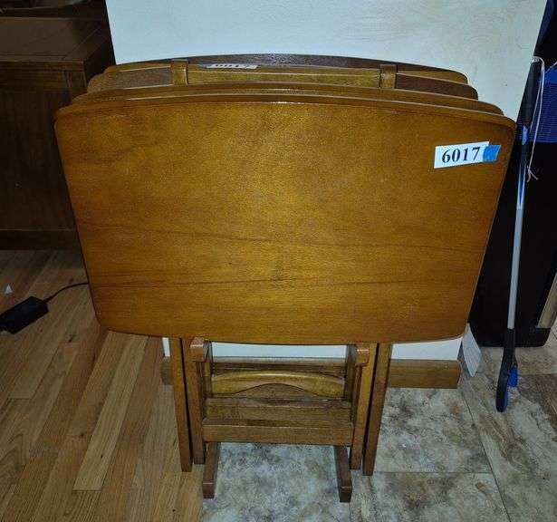 Set of four folding wood tray tables with rack