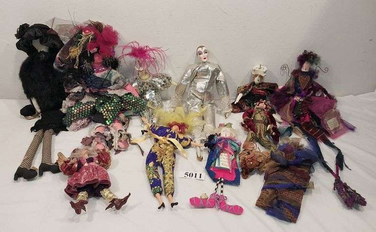 Various themed Porcelain and rag dolls, jester, etc