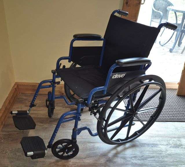 Drive Blue Streak folding wheelchair with removable footrests, handy bar support for entering vehicl