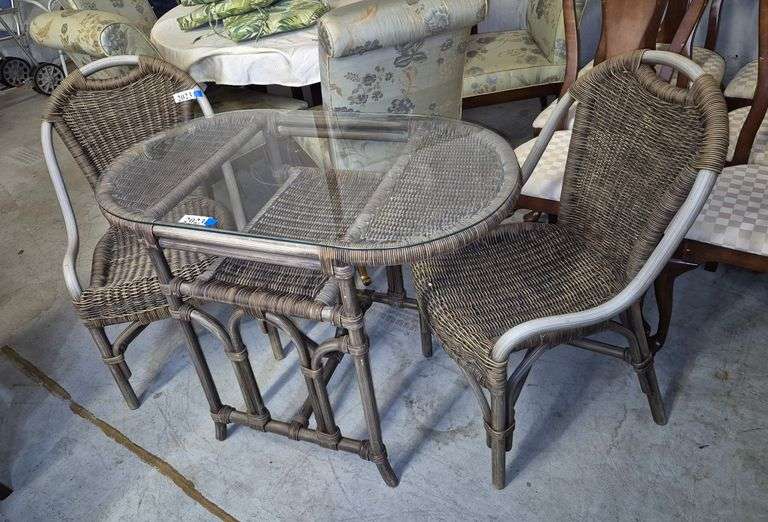 Rattan oval glass top outdoor table and two chairs