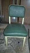 Oak press back rocking chair, fold in half folding table, antique wood step ladder, industrial chair