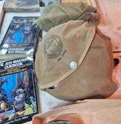 Boy Scout mess kit, rocks, fossil book, antique readers, Frederick Remington book, Jedi Masters quiz