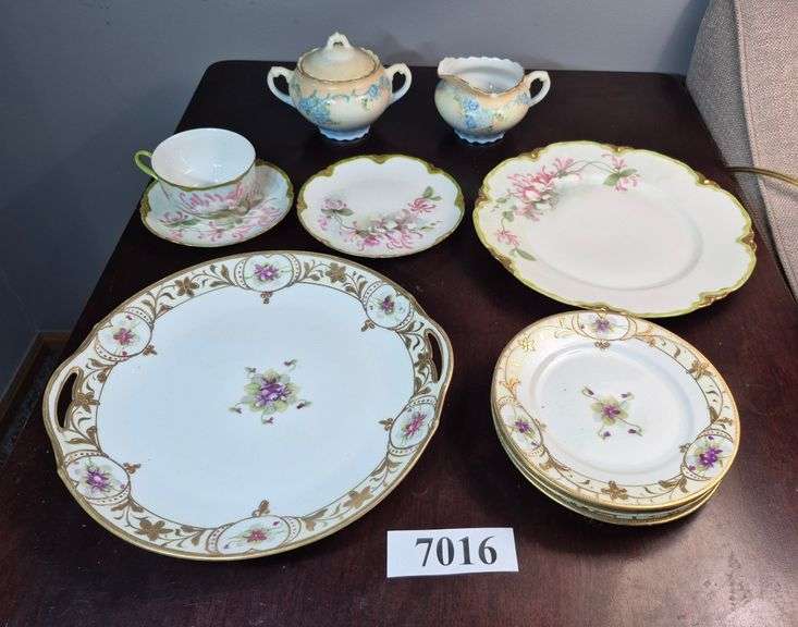 Hand painted Nippon gold rim plates, hand-painted Haviland plates cup and saucer, and painted cream