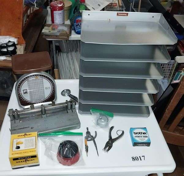 Office supplies: steel paper organizer, scale, mechanical pencil sharpeners, etc