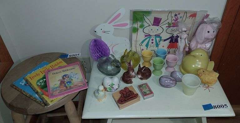 Easter decorations, children's books, bunnies on nests, Longaberger yellow Peep top, figurines, etc