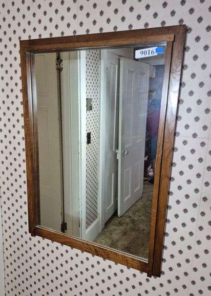 Wood framed mirror, embroidered wall clock