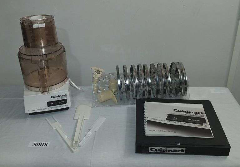 Cuisinart DLC-8 Plus Food Processor with attachments and instructions, and recipe book