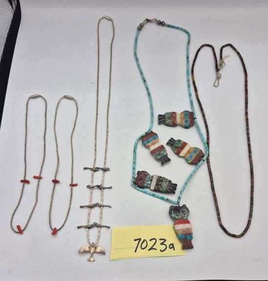 Five necklaces including Stone owls, silver? Birds, Coral pieces, Etc