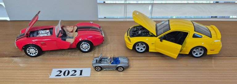 Three diecast cars