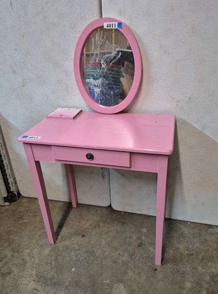 Pink vanity and mirror