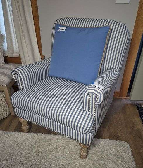 Blue striped armchair with accent pillow