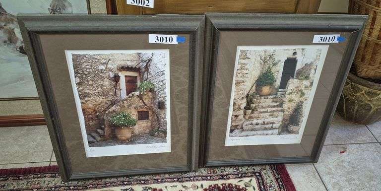 Pair of framed artists signed photographs