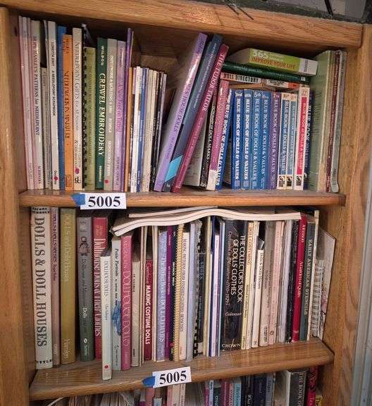Two shelves of books including doll books, dollhouse books, quilt, needlework, pattern books, Etc