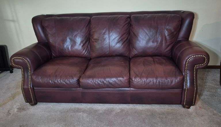Maroon leather sofa
