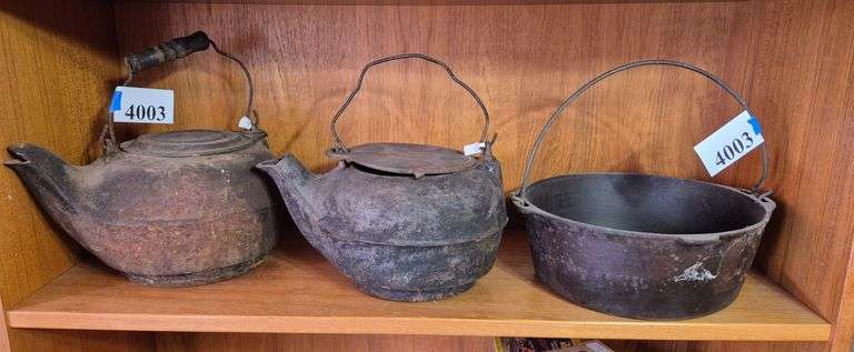 Cast iron kettles and pan