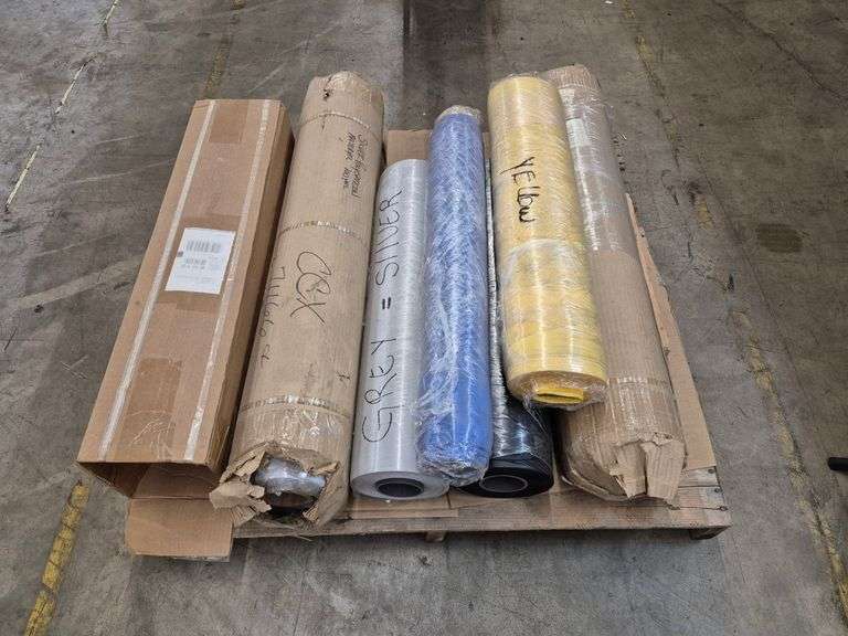 Pallet of rolls of fabric