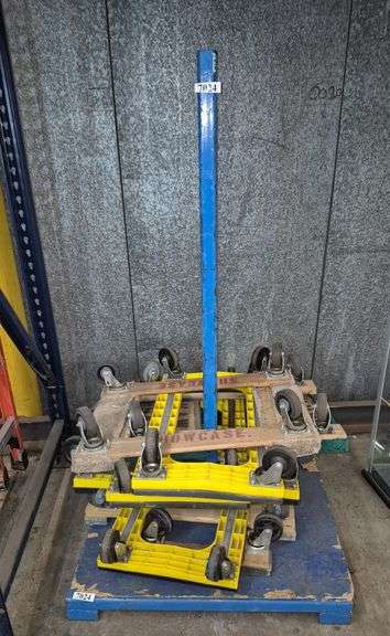 Six 4-wheel movers's dollies, rack