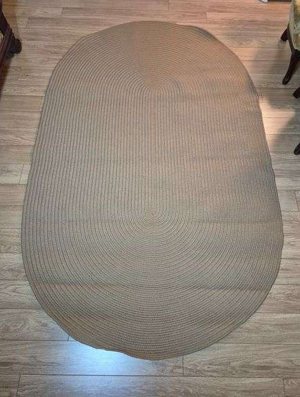 Tan oval rug